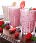 High Quality Honeycomb Milkshake Toppings served in glasses with fresh fruit and vibrant colors.