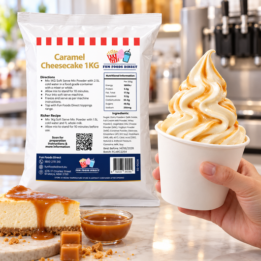Caramel Cheesecake Soft Serve Mix pouch beside a hand holding caramel-topped soft serve